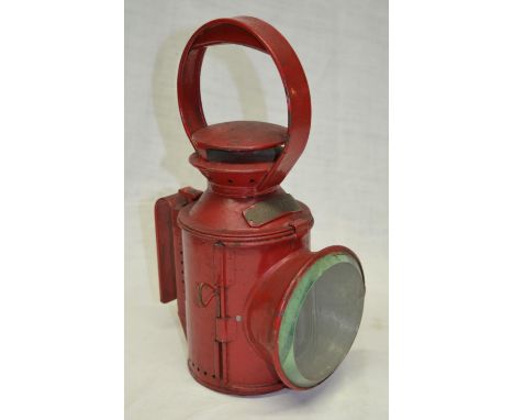 Red railway guards oil lamp, with Woodford plaque 