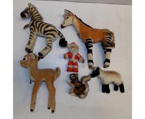 Steiff:- Five plush covered animals and a Santa Claus each with card label.