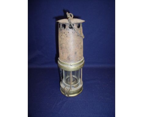 Brass bodied miners hand lamp stamped 1586 with loop handle (25cm high)