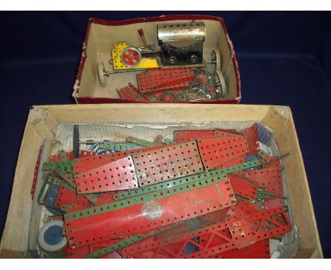Selection of red and blue Meccano and a part Meccano steam engine 