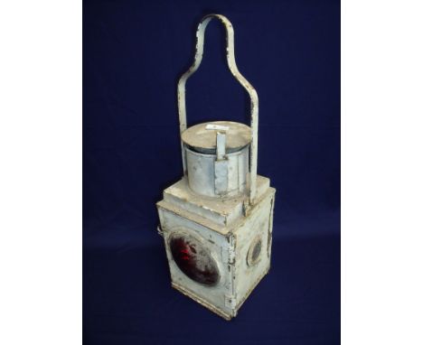 Large white painted railway red bullseye lens lamp
