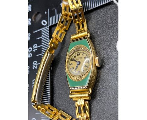 A ladies gold and enamel cocktail watch 18ct gold by Farmer Sydney 