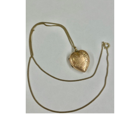 Vintage 9ct gold back and front locket on yellow metal chain