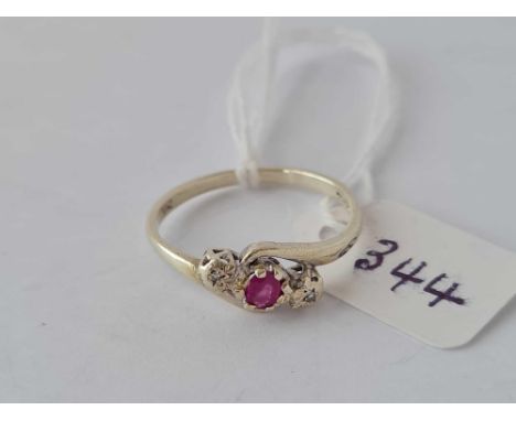 A white gold ruby and diamond ring 9ct size R - 2.5 gms 