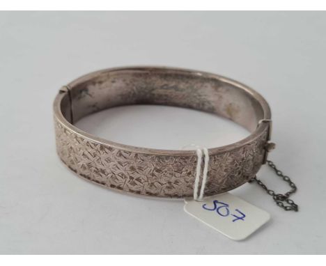 A silver bangle 