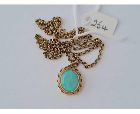 A gold (tested) good colour opal pendant and chain 