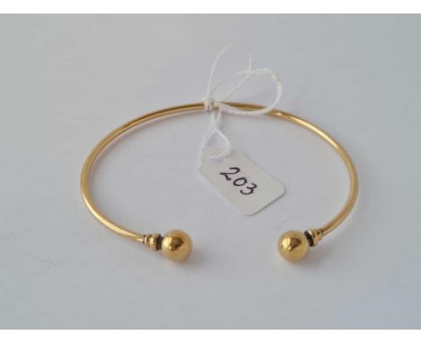 A torque bangle 9ct - 8.3 gms 