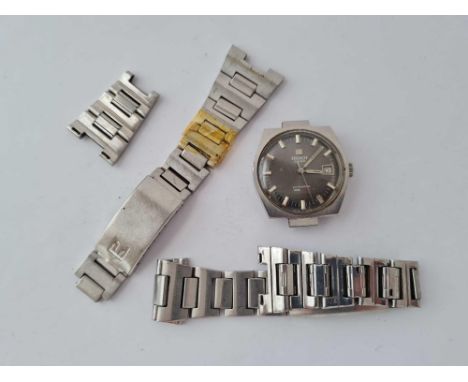 A gents stainless steel Tissot wrist watch with seconds sweep and date aperture W/O but strap AF 