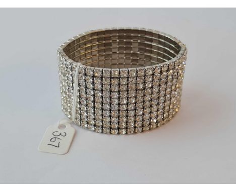 A ten row wide diamante Art Deco style expanding bangle 