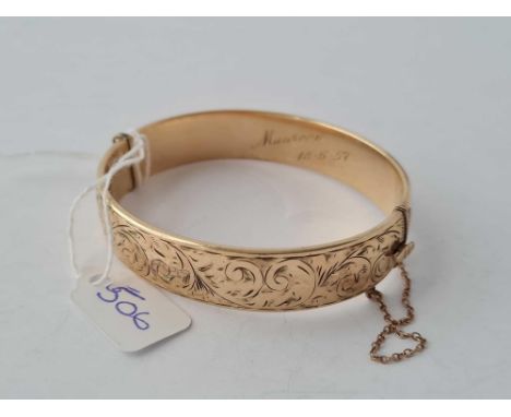 A rolled gold bangle 