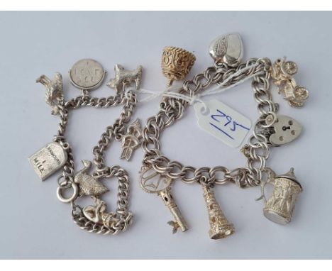 Two vintage solid silver charm bracelets - 56 gms 