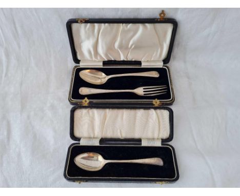 Two boxed Christening sets, one of a spoon and fork and the other of a plain spoon, 55g