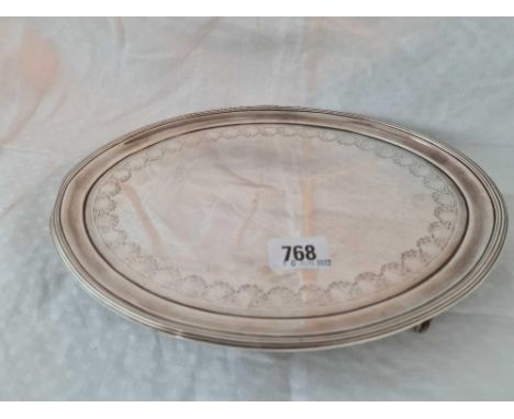 A George III oval salver with reeded rim four bracket feet – London 1799 by P&amp;A Bateman – 10.5” diameter – 490 g.