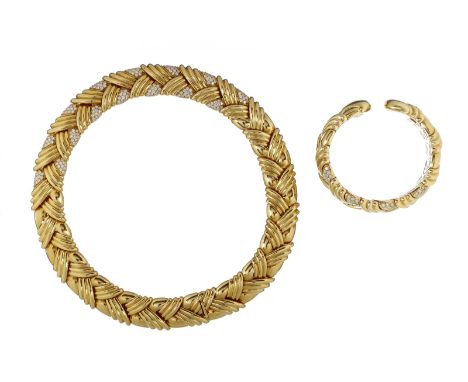 A diamond collar and matching bangle, the yellow gold coloured interlocking gadrooned links pave set at the centre with brill