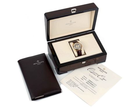 Patek Philippe. A gentleman's wristwatch, Worldtime, Ref. 5130R-018, 18 ct rose gold case with sapphire-crystal back, signed 