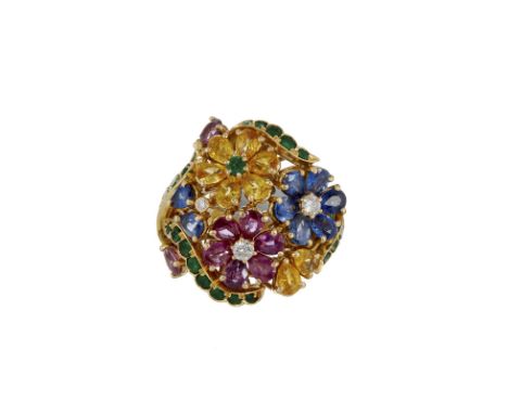 A multi gem set dress ring, set with three flower head clusters of pear shaped sapphires, yellow sapphires and rubies with ci