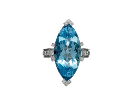 An aquamarine and diamond ring by Massoni, Rome, the marquise cut aquamarine in brilliant cut diamond set claws above a brill
