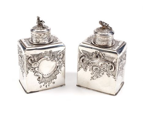 A pair of Queen Anne Britannia standard silver tea caddies by Gabriel Sleath, London 1711, the circular pulll off covers with