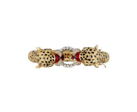 An enamel and diamond leopard bangle by Frascarolo, the confronting enamel and diamond leopard heads with circular cut ruby e