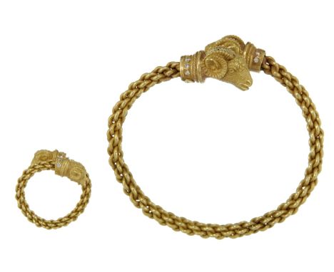 An Italian ram's head bangle and ring suite, the twisted rope work bangle with double ram's head terminals set with brilliant