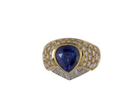 A sapphire and diamond bombe dress ring, the heart shaped sapphire rub over set above a mount and shoulders set with square c