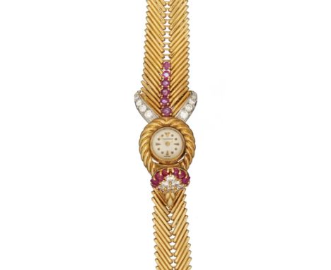 Jaeger LeCoultre for Kutchinsky, a lady's 18 carat gold, ruby and diamond bracelet wristwatch, no. 1419, hallmarked London 19