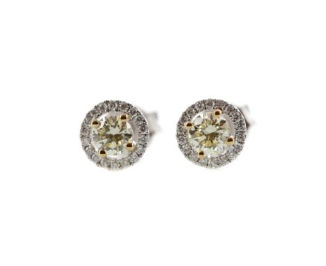 PAIR OF CERTIFICATED YELLOW DIAMOND STUD EARRINGS, set with a central round brilliant cut yellow diamond within a halo of col