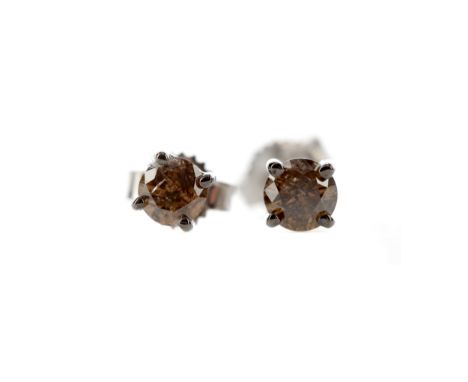 PAIR OF COGNAC DIAMOND STUD EARRINGS, set with round brilliant cut cognac diamonds totalling approximately 0.40 carats, in ni