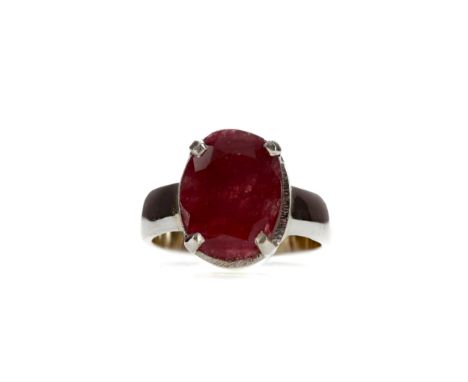 RUBY RING, set with an oval ruby of approximately 7.00 carats, marked 925, L 1/2, 6g