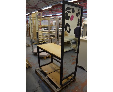 A stained wooden framed shop fitting with mirrored end and shelf attachment, width 121cm.