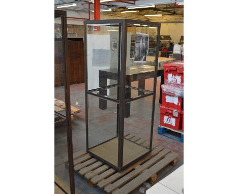 A metal framed display unit with glazed sides and back and central aperture for a shelf (lacking shelf), width 60cm.