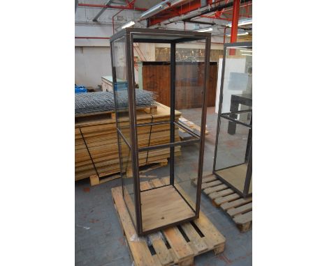 A metal framed display unit with glazed sides, open front and back and central aperture for a shelf (lacking shelf), width 60