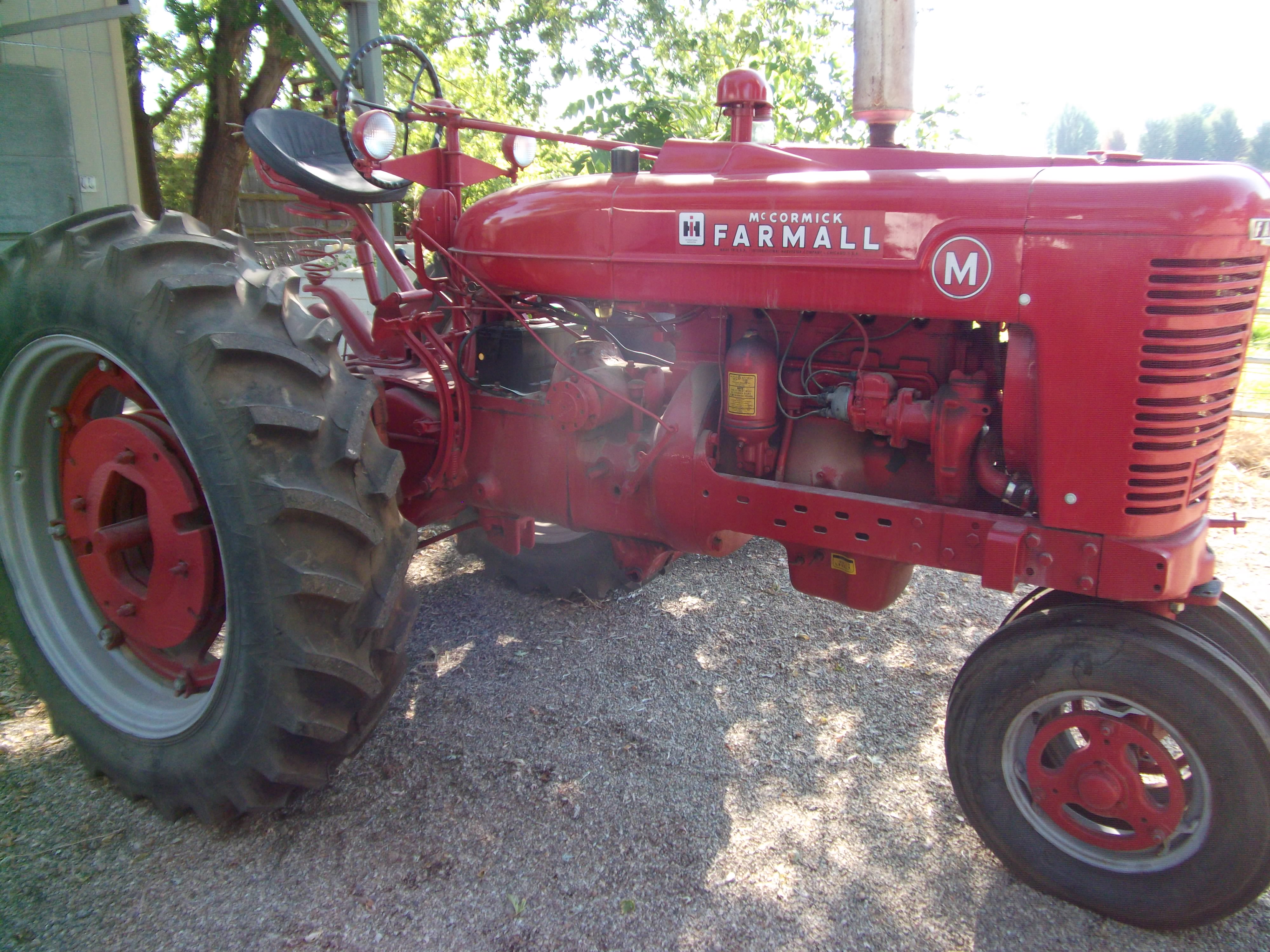 1939 Farmall M, New 15.5 X 38 Rubber with Wheel Weights