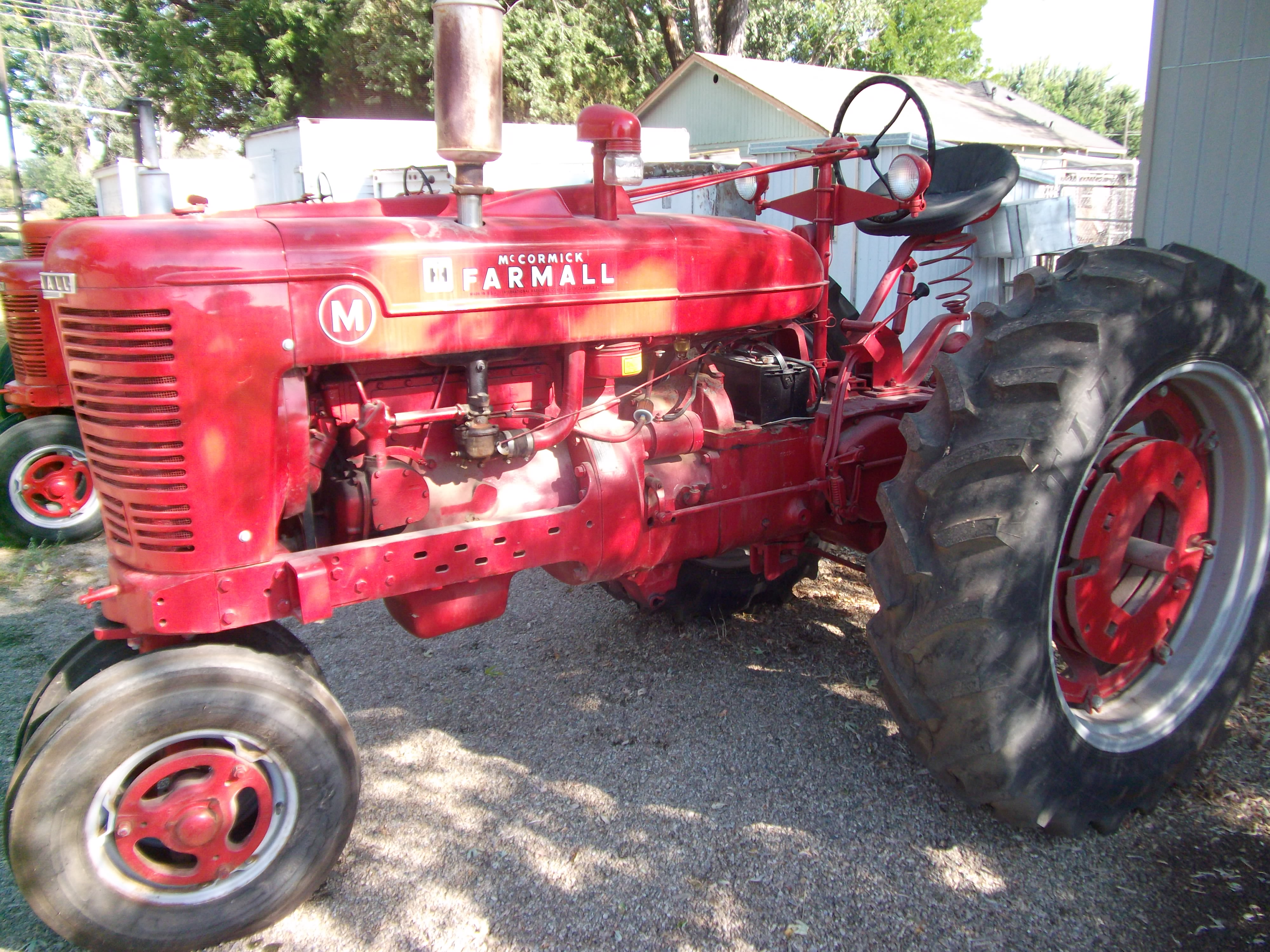 1939 Farmall M, New 15.5 X 38 Rubber with Wheel Weights