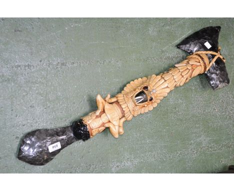 A 20th century South American Tribal rain dance axe head staff, central Tribal totem mask head