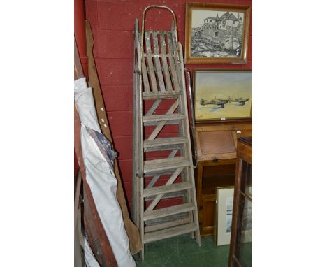 Two vintage wooden step ladders