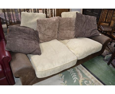 A contemporary leather two seat sofa
