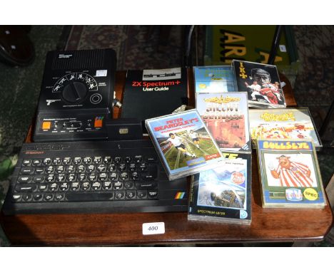 A Sinclair ZX Spectrum Plus Computer, games, joysticks etc; a Prinztronic video sport six game console, etc 