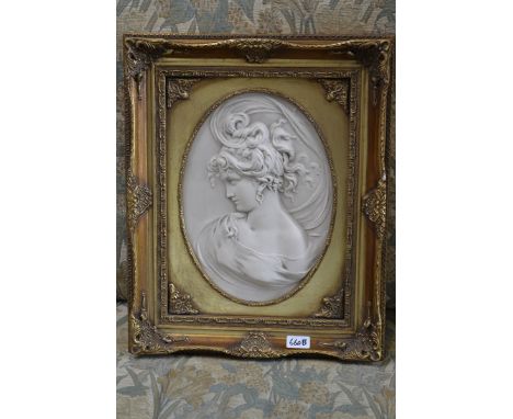 A reproduction ceramic plaque, moulded in relief with a Renaissance style figure