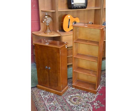 A contemporary yew wood cabinet of small proportions, and a yew wood bookcase of narrow proportions (2)