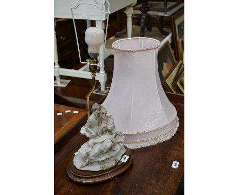 A Capo Di Monte figural table lamp