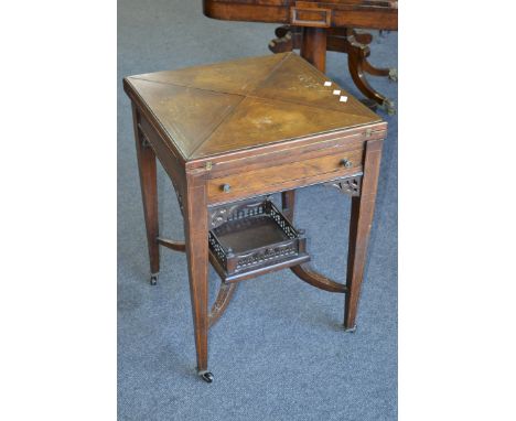 Inlaid envelope walnut card table, the leaves inlaid with satinwood swags and flora, single drawer to frieze, pierced gallery