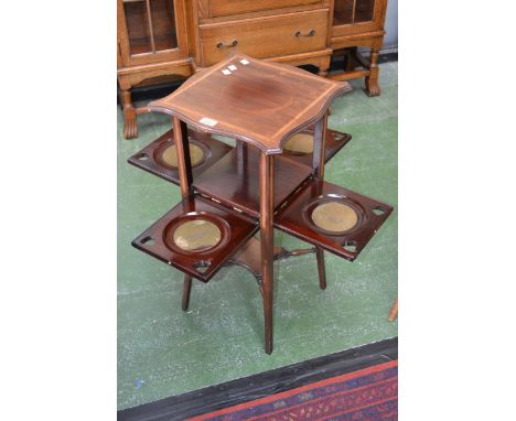 An Arts and Crafts inlaid plant/cake stand, shaped square top, four hinged sides opening to felt lined cups. undertier, outsw