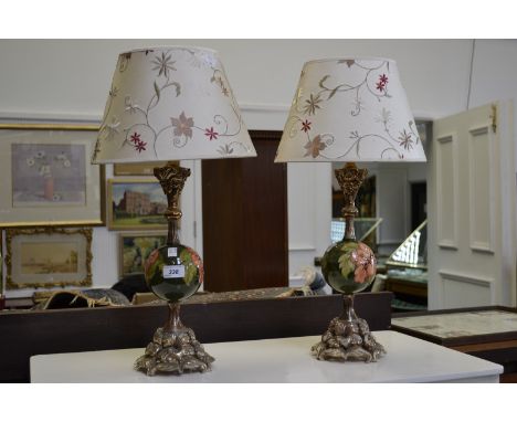 A Moorcroft lamp with silk shade; another similar (2)