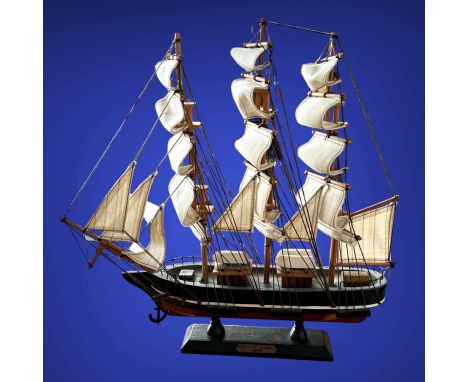 Vintage Cutty Sark 1869 wooden Model Ship on wooden plinth with fabric sails. Measures 11 inch by 13 inch appx. We combine po
