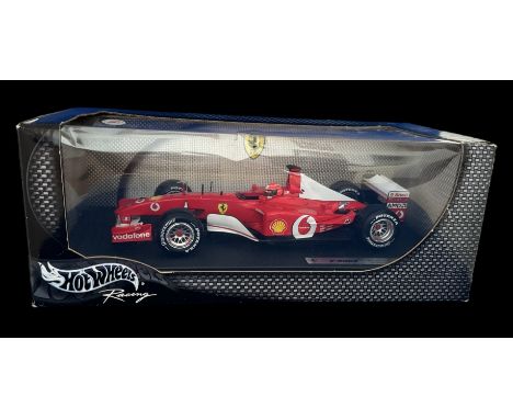 Mattel Hot Wheels Racing F2002 Michael Schumacher Formula one race car. In original box, 54626 Michale Schumacher. We combine
