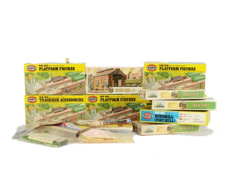 Unmade Airfix OO Gauge Railway-related Kits, including eleven assorted rolling stock items, engine sheds, platform figures, p