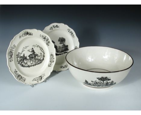 A 'Leeds: c.1780' creamware punch bowl and two plates, each printed in black, the bowl with the initial K in the interior and