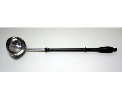 A George II silver punch ladle, by William Justis, London 1735, with ovoid bowl and turned wooden handle, 33.5cm  