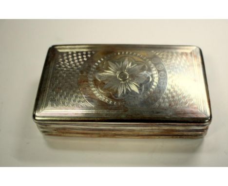 An early 19th century Dutch silver tobacco box, maker HK, 1825, rectangular with engine turned design to cover and body, 10.7